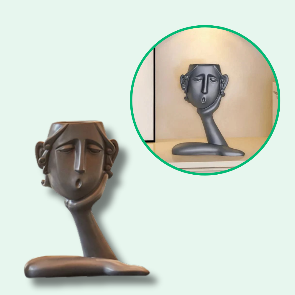 Vaso de flores com rostos artísticos elegantes